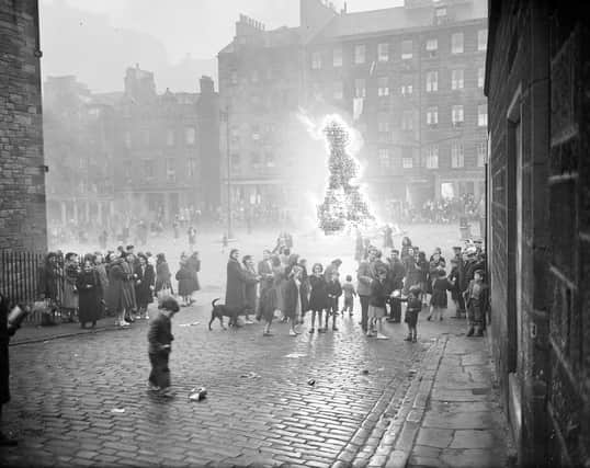 A bonfire to mark Victoria Day on the Grassmarket in May 1952.