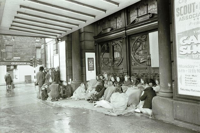 Before there was Ticketmaster, the only way to get a  ticket to a gig was to queue at the venue - even if that meant camping out all night!
The fans are all sitting outside the King's Theatre for Led Zeppelin tickets.