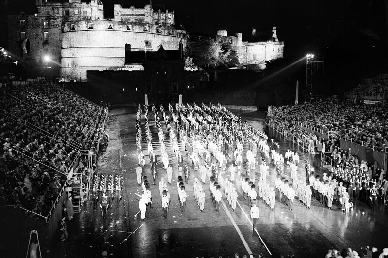 Grand finale of the Edinburgh Tattoo in 1961 - a floodlit Edinburgh Castle and battlements.