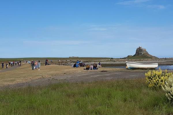 The short walk from Holy Island village to Lindisfarne Castle offers lovely views of the harbour and across to Bamburgh.