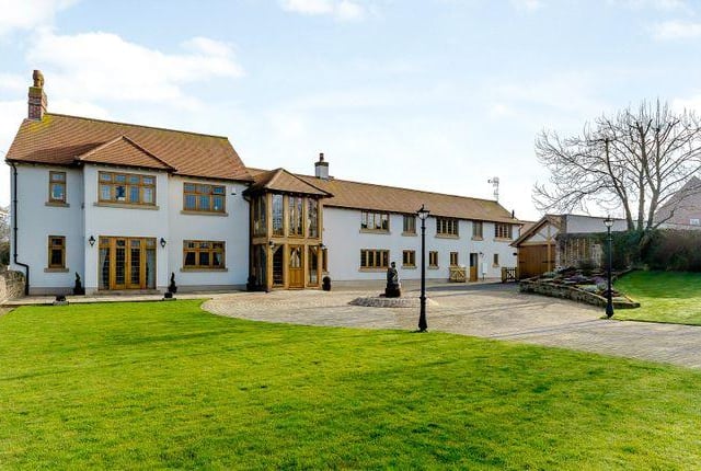 This four bedroom house has games and entertaining room and indoor swimming pool.