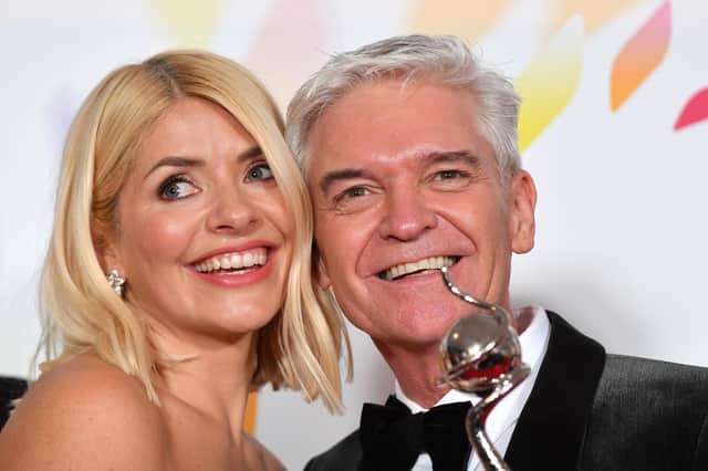 Holly Willoughby and Phillip Schofield pose with the award for Live Magazine Show for 'This Morning'  (Photo by Gareth Cattermole/Getty Images)