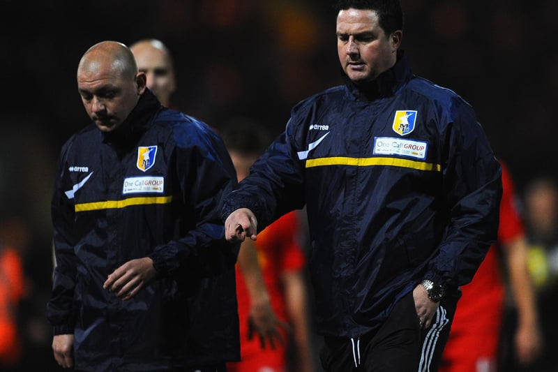 A disappointed Paul Cox with assistant Adam Murray after a controversial FA Cup defeat by Liverpool.