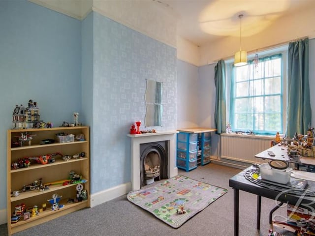 This room is currently being used as a playroom.