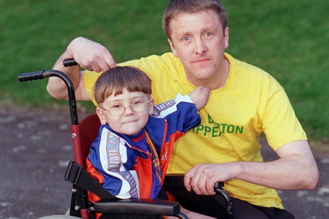 John Williams and his Sheffield half marathon. partner 5 year old Kyle Barton in 1999.