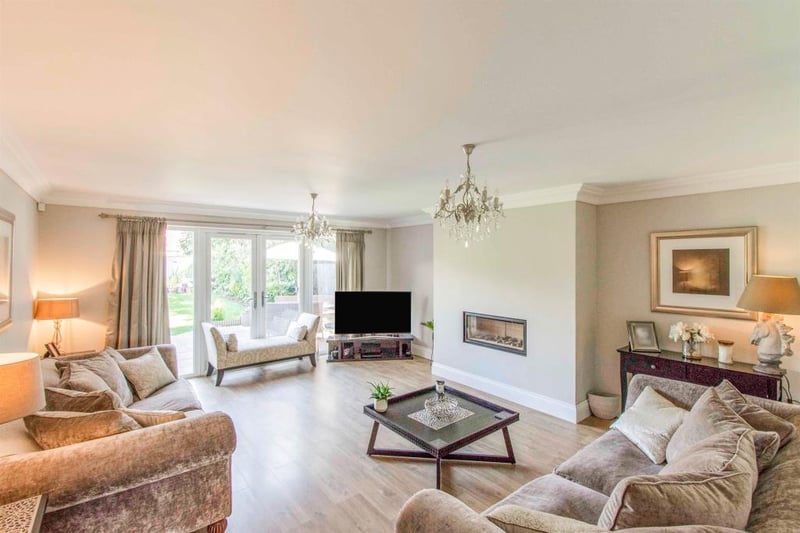 Beautiful lounge, perfect to relax and unwind with rear facing double glazed French doors  which gives a beautiful view of the rear garden. The focal feature point of the room is the bespoke gas living flame fire.
