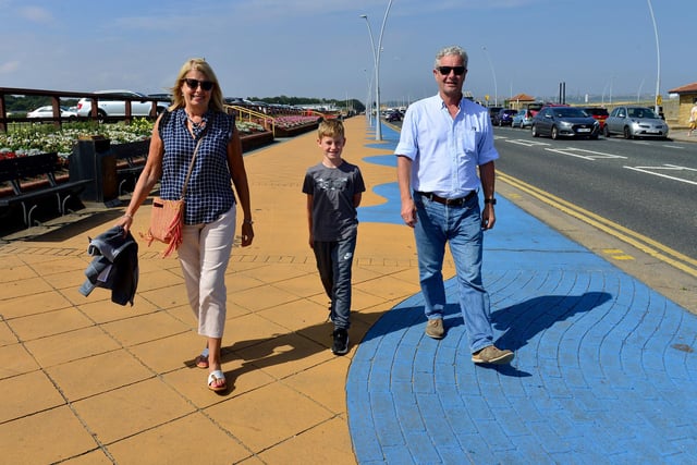 Striding out together - Janice and Graham Dockrill with their grandson Archie Wilson in South Shields.