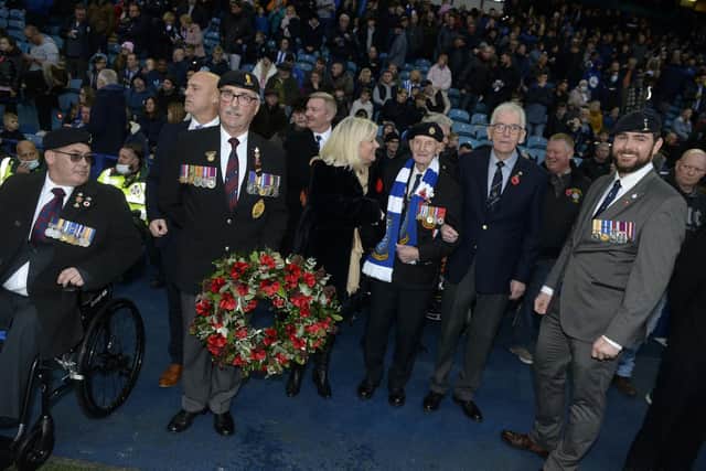 D-Day veteran Cyril Elliot, centre with scarf, and other serving or former members of the forces laid a wreath at Hillsborough for Remembrance ahead of Sheffield Wednesday's match against Gillingham. Pic Steve Ellis
