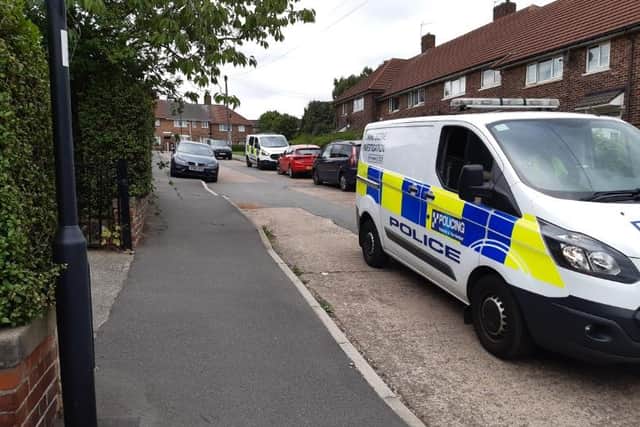 Shocked residents have told how armed police flocked to their street last night as a man was arrested on suspicion of attempted murder. Picture shows police on the scene today