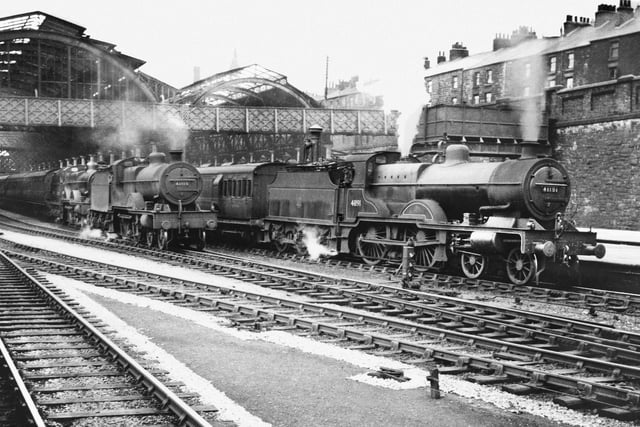 Two Class 4P steam locomotives stand at Sheffield Midland in 1948.