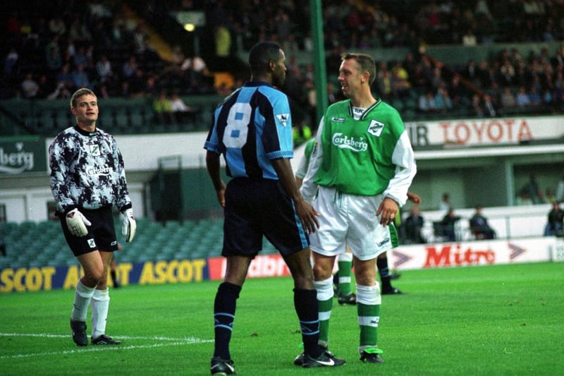 Willie Miller has words with Coventry City's Kyle Lightbourne as Chris Reid looks on during a pre-season clash in July 1997