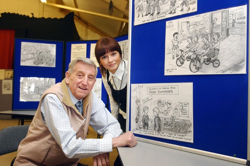 Theo Bernstein was pictured with some of his cartoons about life in the East End. Pictured with him in 2005 was Angela Gilbertson who was the administrator at the East End Community Centre.