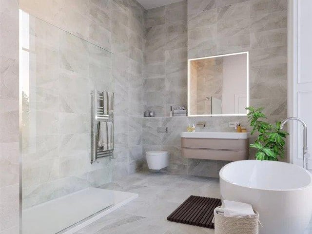 A grand bathroom is on offer in the Georgian flat continuing the theme of open plan spaces in the flat which make for light and airy contemporary living (photo: Rettie).