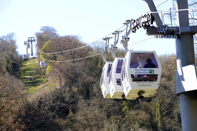 Admire the magnificent views of the Peak District in the cable cars. Also grab a meal in the restaurant, but, make sure you make a reservation.