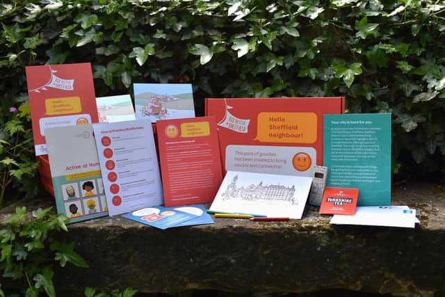 The 'Hello Neighbour' boxes contain various activities, gifts, and support information for people aged 50 or over