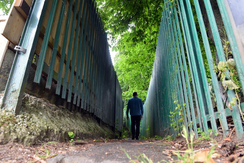 A narrow pathway, pictured here as it leads off Hedworth Lane, Jarrow. You can probably imagine where it gets its name from.