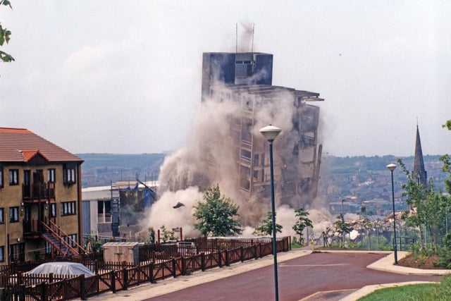 One of the Hyde Park flats blocks in Sheffield comes crashing down on June 2, 1993. The crushed remains of the flats were reputedly used to fill in the city's Hole in the Road subway.