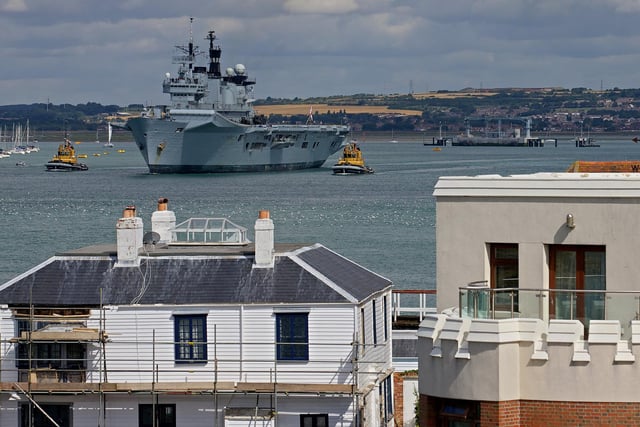 HMS Illustrious leaving Portsmouth Naval Base on August 12, 2013. Picture: Andrew Cowie/AFP via Getty Images