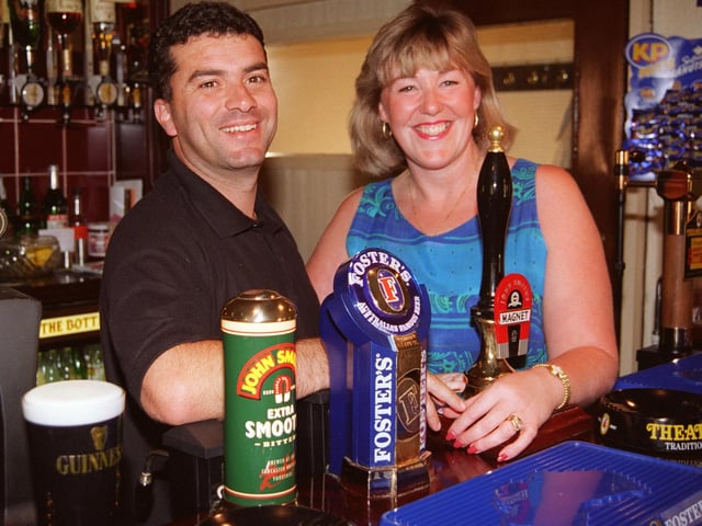 Landlord and landlady George and Alison Micalles behind the bar at the Masons Arms in 1997