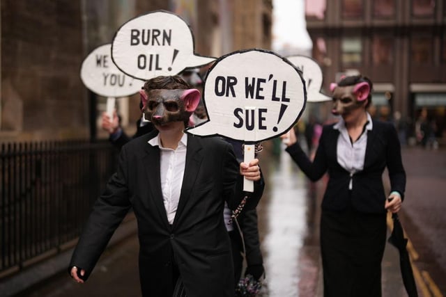 These demonstrators impersonated those in favour of the continued burning of fossil fuels (Getty Images)