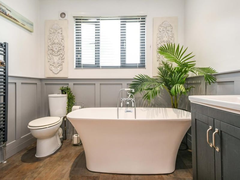 There is a fantastic, four-piece family bathroom on the first floor with a double-glazed window, heated towel rail, part panelled walls and an extractor fan.