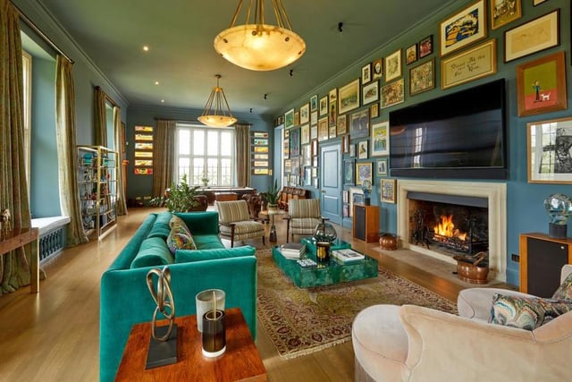 'Let Me Entertain You' is what Robbie Williams might well be singing as he shows you round his Wiltshire mansion. A period home with seven bedrooms and eight bathrooms, it includes this spectacular sitting room.