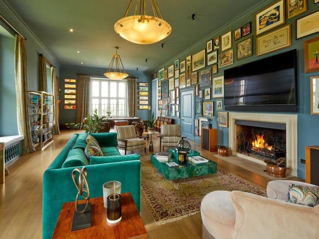 'Let Me Entertain You' is what Robbie Williams might well be singing as he shows you round his Wiltshire mansion. A period home with seven bedrooms and eight bathrooms, it includes this spectacular sitting room.