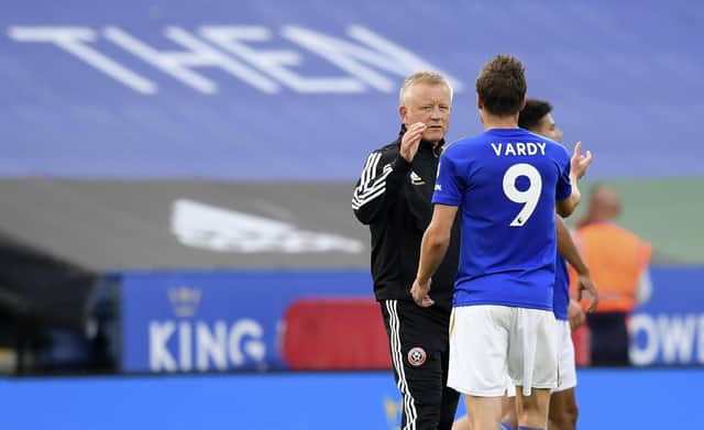 Sheffield United's manager Chris Wilder, left, shakes hands with Leicester's Jamie Vardy at the end of the English Premier League soccer match between Leicester City and Sheffield United at the King Power Stadium, in Leicester, England, Thursday, July 16, 2020. (Michael Regan/Pool via AP)