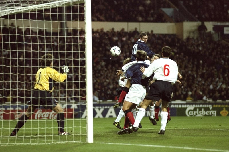 Don Hutchison rises highest to head the winner at Wembley in 1999 - but England progressed to Euro 2000 on aggregate