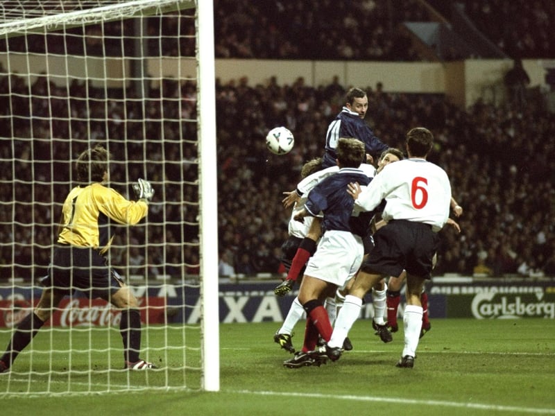 Don Hutchison rises highest to head the winner at Wembley in 1999 - but England progressed to Euro 2000 on aggregate