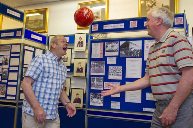 Dennis McInnes and Stuart McKenzie members of the Glenrothes Juniors 1975 Scottish Junior Cup winning side at Glenrothes Heritage Centre's Glens 5oth anniversary exhibition (Pic: Steve Brown)