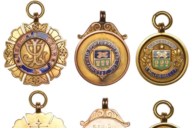Badges, Football: Sheffield Sports & Athletic League, gold and enamel by Vaughton, named (Sen. Div. Winners, 1932-33, A. Thompson, 34 Hicks St, Sheffield, K.I.J.C./23/2), 25mm, hallmarked Birmingham 1932, 5.43g; Sheffield & Hallamshire C[ounty] F[ootball] A[ssociation], gold and enamel by Vaughton, named (Wharncliffe Charity Cup Winners, 1937-38, A. Thompson, Sheff. Wed. F.C.), 23mm, hallmarked Birmingham 1937, 9ct, 5.51g; Yorkshire League, gold and enamel by Fattorini, named (Winners 1938-9, Sheffield Wed. F.C., A. Thompson), 29mm, 9ct, 8.29g [2]. Some enamel missing from last, otherwise very fine and better; with clips and rings for suspension £200-£260. Dix, Noonan, Webb