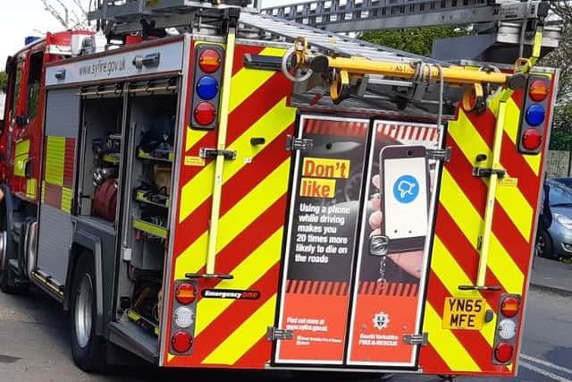 A headteacher says a fire near his Sheffield school showed how dangerous nearby car parking is, after firecrews struggled to access a blaze. File picture shows South Yorkshire fire engine