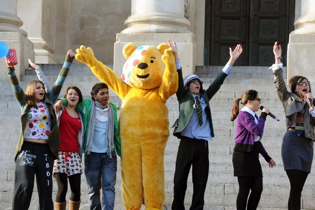 2010. Children in Need 2010 fundraisers from Highbury College in Guildhall square take part in Karaoke sing YMCA L-R Alexandra Attard 17, Paris Mitchell 17, Gudda Ghosh 17, Pudesy Bear, Joshua Vazequez 17 Richelle French 16, Sophie Legg 17 
Picture: Paul Jacobs  (103758-9)