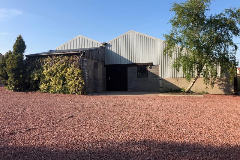 A large gravelled area offers ample parking space and provides access to the stable block.