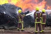 Residents are being warned to keep their windows and doors closed after a serious fire broke out in South Yorkshire. File picture shows South Yorkshire firefighters