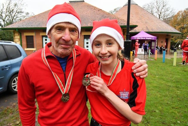 David Ince with his granddaughter Natasha Burby after they completed the Santa Run.