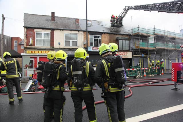 Firefighters tackling the blaze. Picture by SYFR