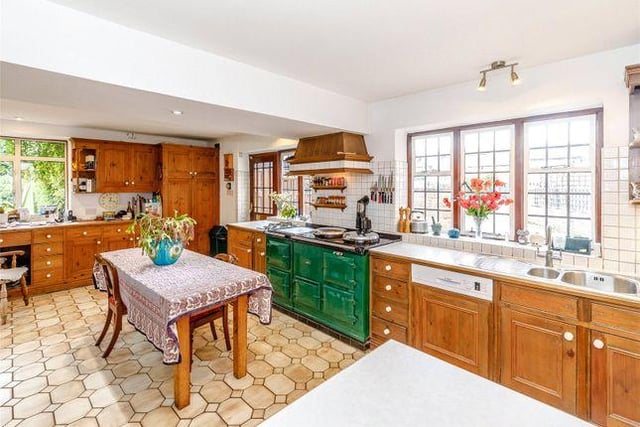 The spacious kitchen is perfect for entertaining or sitting down to a family meal