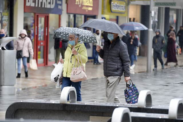 Shoppers wearing masks as they return to the shops in Sheffield City Centre
