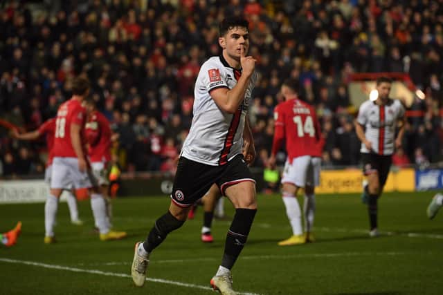 John Egan of Sheffield United celebrates his equaliser during the The FA Cup match at the Racecourse Stadium, Wrexham: Gary Oakley / Sportimage