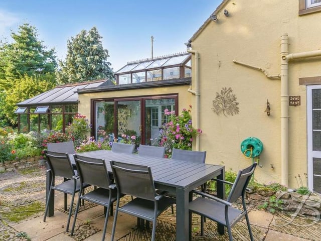 A patio-type area offers the ideal place to entertain family or friends. Imagine sitting here with a glass of wine on a summer evening.