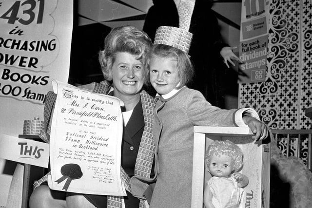 Here you can see Mrs J Carse and her daughter at Leith Provident, after Mrs Carse won one million Co-Op dividend stamps, making her a “stamp millionaire” in August 1970. Her daughter was given a Tiny Tears doll.