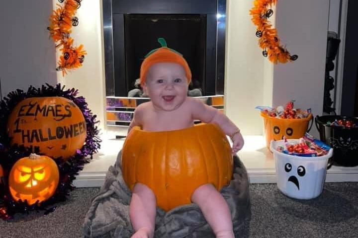 Ezmae, aged four months, celebrating her first Halloween.