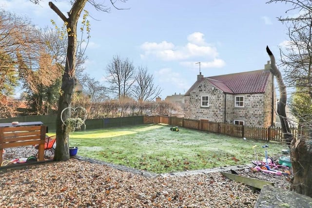 To complete our photo gallery, we take a look at the back of the property and the huge garden. There might be frost on the ground, but it's crystal clear the garden has an enormous amount of scope.