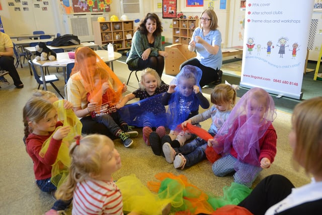 MP for Sunderland Central Julie Elliott joins in a wonderfully colourful Spanish class at the Apple Blossom Nursery, on Durham Road in 2014.