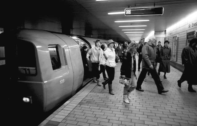 Passengers leaving the subway train at St Enboch underground station in Glasgow, December 1986.