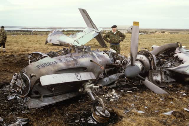 File photo dated 20/06/1982 of the wreckage of an Argentine Pucara Aircraft on the airfield at Goose Green. PRESS ASSOCIATION Photo. Issue date: Sunday March 18, 2012. Thirty years ago the Falkland Islands suddenly went from being a forgotten corner of what remained of the British Empire to a dramatic test of the UK's global power status.  The remote group of boggy, windswept islands in the South Atlantic, whose 1,800 human inhabitants were vastly outnumbered by sheep, became a battleground between the ambitions of Argentina's military junta and the steely determination of Margaret Thatcher. Simmering diplomatic tensions over the ownership of the Falklands boiled over in the spring of 1982 and Argentine forces invaded the islands they call the Malvinas.  In response, Britain launched its biggest naval operation since the Second World War, sending a task force of 27,000 personnel and more than 100 ships to retake the territory. Lasting just 74 days, the Falklands War claimed the lives of more than 900 people. See PA story HISTORY Falklands. Photo credit should read: Martin Cleaver/PA Wire