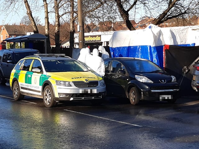 Police at the scene of the alleged murder on Wath Road Mexborough today. The alleged shooting  happened on January 11
