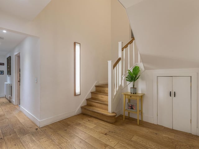 A wide, spacious hallway, perfect for physical distancing when people come round.